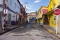 Unidentified people walking on the colourful streets of downtown Port Antonio, Jamaica.